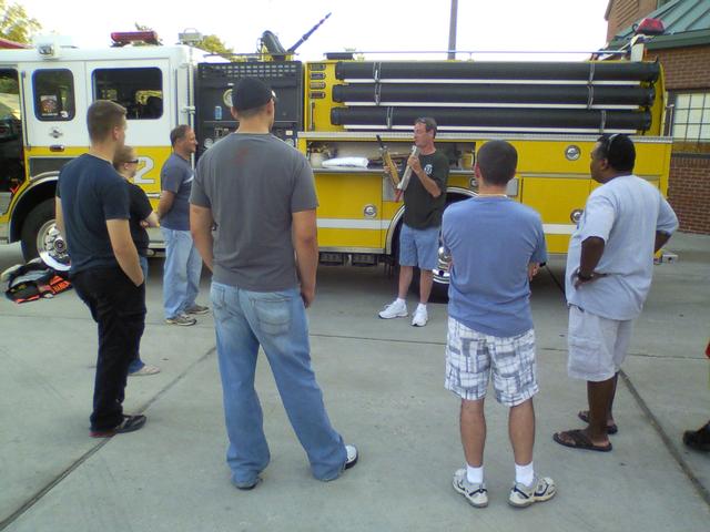 Fire Chief Joe Gould going over Engine 32 with some new recruits June 21, 2010.